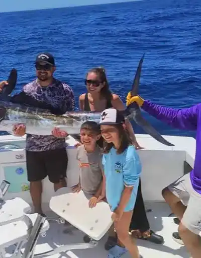 A charter boat heading out for a day of fishing in Cabo.